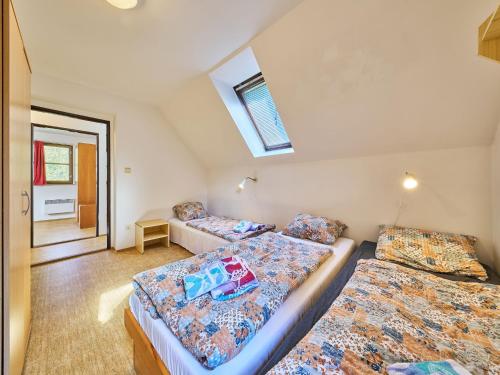 Ένα ή περισσότερα κρεβάτια σε δωμάτιο στο Holiday Home Stárkov by Interhome