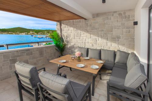 Seafront Villa Kupinica with heated Pool