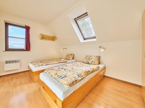 Postel nebo postele na pokoji v ubytování Holiday Home Stárkov by Interhome