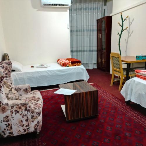 Postel nebo postele na pokoji v ubytování Qasri Kokcha Hotel هوتل قصر کوکچه