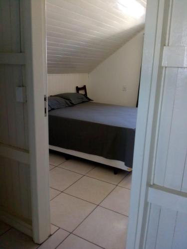 Ένα ή περισσότερα κρεβάτια σε δωμάτιο στο Jardim dos Sonhos