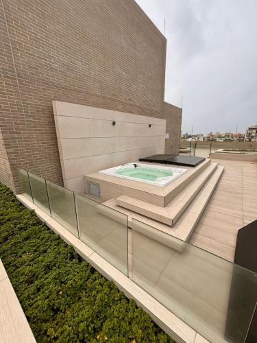 Piscina a District Aptosuite 404 o a prop