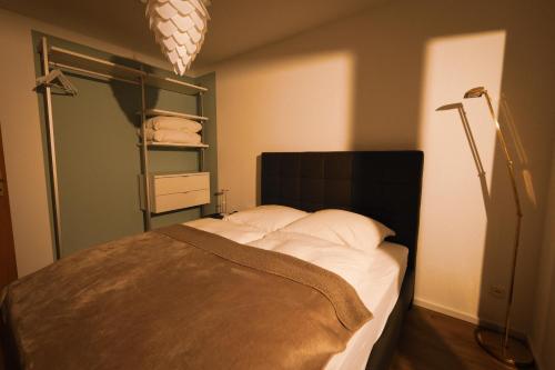 Postel nebo postele na pokoji v ubytování Apartment 4