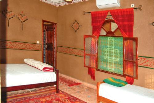 Ένα ή περισσότερα κρεβάτια σε δωμάτιο στο Charming house in Zagora with pool