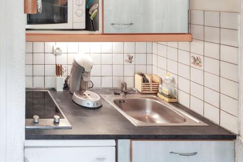 Køkken eller tekøkken på Studio chaleureux à La Salle-les-Alpes - Vue montagne 19m²