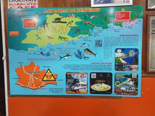 a map of australia on a wall at Trotamundo Oaxaca Hostel in Oaxaca City