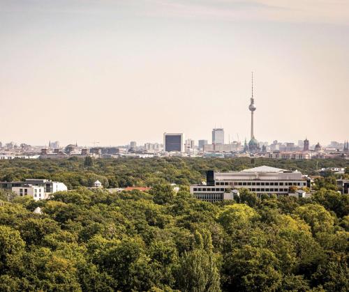 a view of the city of berlin with the tv tower at Waldorf Astoria Berlin in Berlin