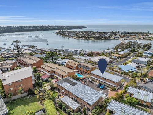 an aerial view of a small town with a harbor at Hydra Holiday Unit 3 in Merimbula