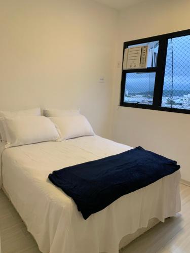 Ένα ή περισσότερα κρεβάτια σε δωμάτιο στο Apartment in Barra da Tijuca