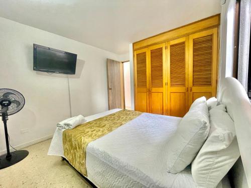 Postel nebo postele na pokoji v ubytování Hotel Torre Primavera