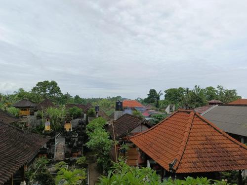 an overview of a village with roofs at Tulak House in Blahbatu