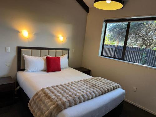 Postel nebo postele na pokoji v ubytování Abbey Motor Lodge