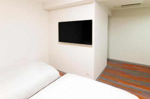 TV a/nebo společenská místnost v ubytování Sasebo Green Hotel
