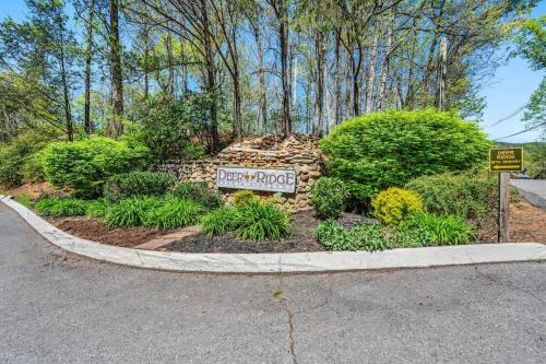 a sign for a garden in a yard at Point of View in Gatlinburg