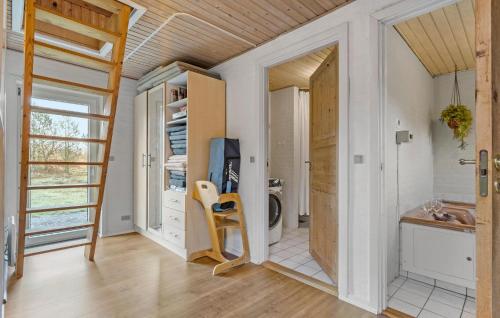 a room with a staircase and a room with a closet at Nice Home In Nørre Nebel With Sauna in Nørre Nebel