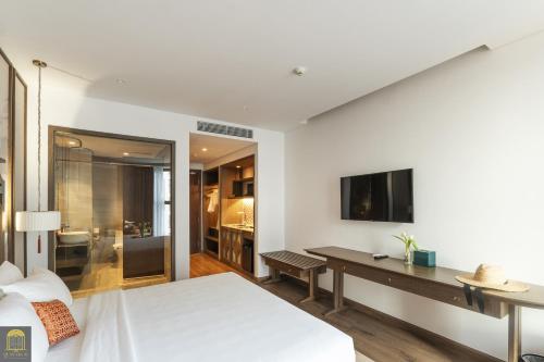 TV a/nebo společenská místnost v ubytování Apec Beach Mui Ne Resort