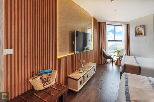 TV a/nebo společenská místnost v ubytování Apec Beach Mui Ne Resort