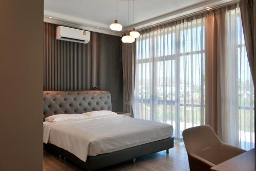 Ένα ή περισσότερα κρεβάτια σε δωμάτιο στο Phuket Villa Sofia