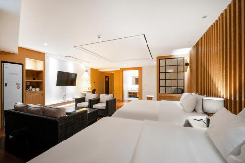 Postel nebo postele na pokoji v ubytování Hotel Artheim