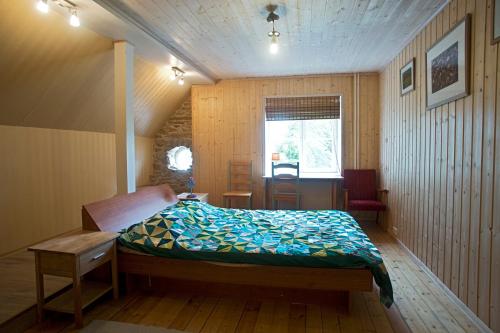 Postel nebo postele na pokoji v ubytování Haeska Manor
