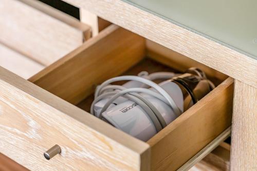 a drawer in a desk with a drawer at CHECK inn Express Taichung Fengchia in Taichung