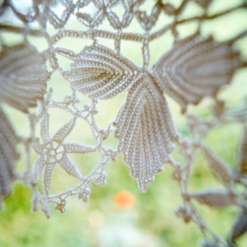 a close up of a net with flowers on it at Hotel Dreiländerblick Dornbirn in Dornbirn