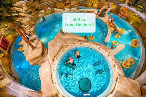 Bazén v ubytování Hotel Medūna nebo v jeho okolí