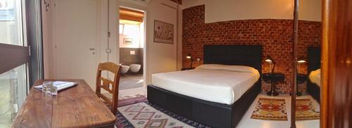 A bed or beds in a room at Loft Verona