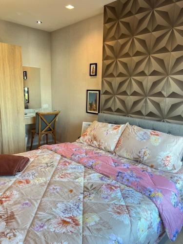 Katil atau katil-katil dalam bilik di Escent condo chiangmai A