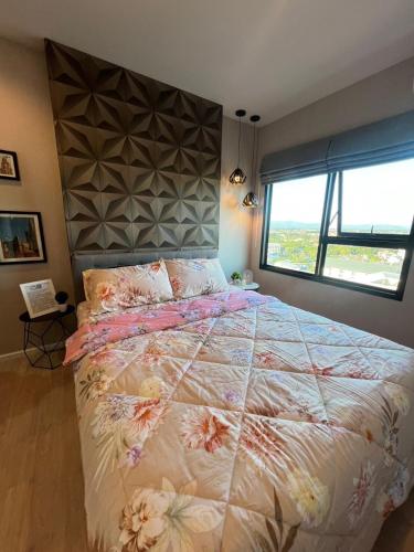 Katil atau katil-katil dalam bilik di Escent condo chiangmai A