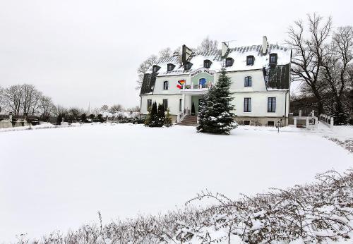 L'établissement Hotel Pałac w Myślęcinku en hiver