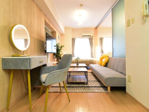 Zona de estar de Alphabed福山西桜町
