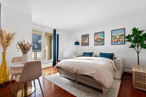 En eller flere senge i et værelse på Geranimus Versailles Hesperides