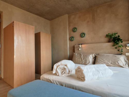 Ένα ή περισσότερα κρεβάτια σε δωμάτιο στο Qb Apartments