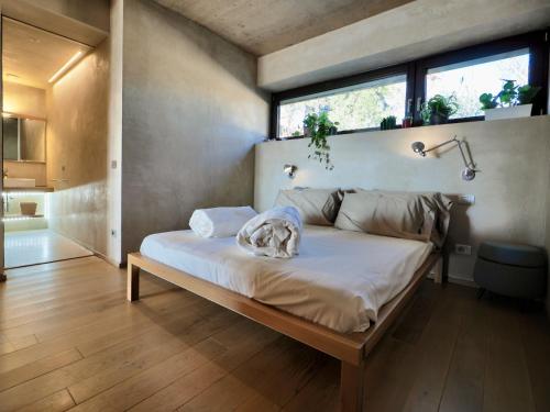 Ένα ή περισσότερα κρεβάτια σε δωμάτιο στο Qb Apartments