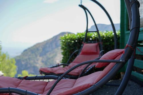 a row of empty seats on a bus at Torre de Arriba Casa Rural in Benimantell