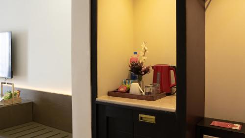a bathroom with a sink and a counter top at Ramada Resort by Wyndham Gilgit in Gilgit