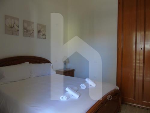 Postel nebo postele na pokoji v ubytování Homiday - Residenza Tulipani