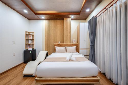 Postel nebo postele na pokoji v ubytování Cozrum - Cozy Home Phú Yên