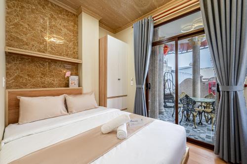 Postel nebo postele na pokoji v ubytování Cozrum - Cozy Home Phú Yên