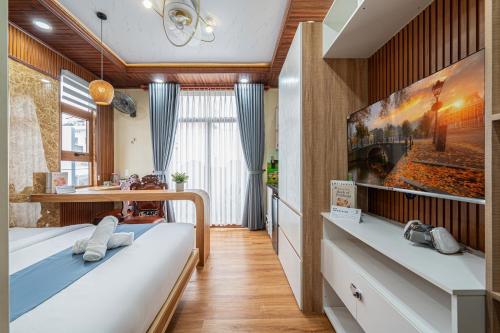 Postel nebo postele na pokoji v ubytování Cozrum - Cozy Home Phú Yên