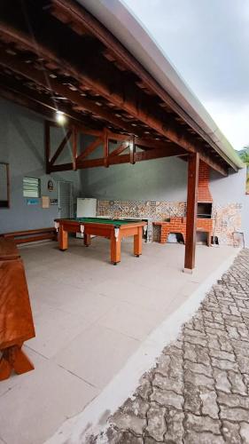 Φωτογραφία από το άλμπουμ του Casa do Zeca Próxima a praia da Cocanha com wifi - área gourmet 35 m2 - Localização imbatível σε Caraguatatuba