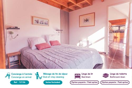 a bedroom with a bed in a room with a window at Maison pour 10, avec un grand jardin et une piscine in Penvénan