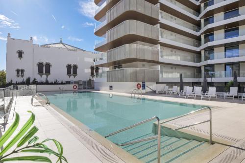 Foto ViVi Homes - Jade Beautiful Apartment with Spa, Pool and Cinema 200 meters from the beach 1