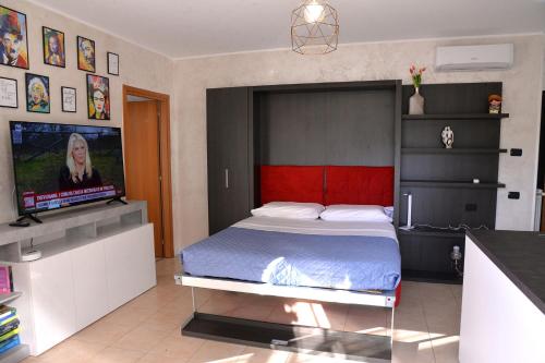 Postel nebo postele na pokoji v ubytování Casa diva - giardino e box auto