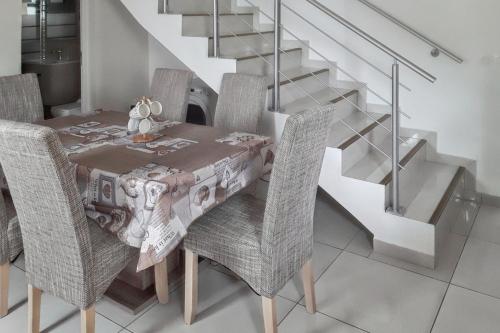 Posezení v ubytování Appartement vue mer au Tampon - 51 m² - Terrasse