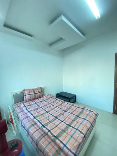 a bedroom with a bed in a room at The Moonvine on 360 in Phnom Penh