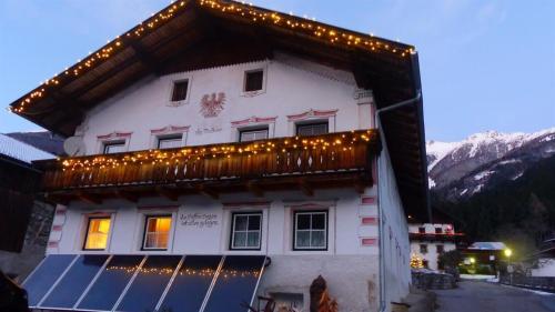 a building with a lot of lights on it at Multererhof in Nikolsdorf