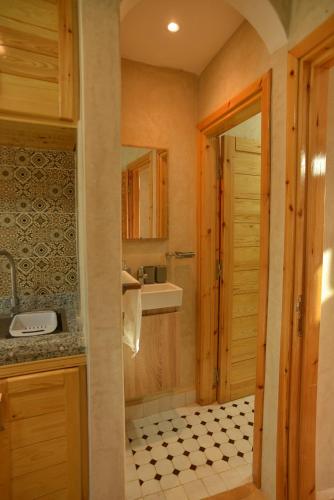 a kitchen with a sink and a counter top at Tirazir House 6 in Mirleft