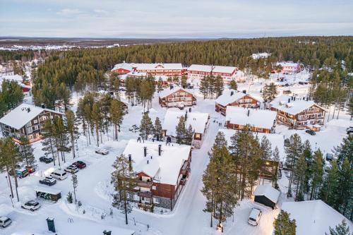 an aerial view of a resort in the snow at Levillas Skimbaajankuja 6 as3 in Levi